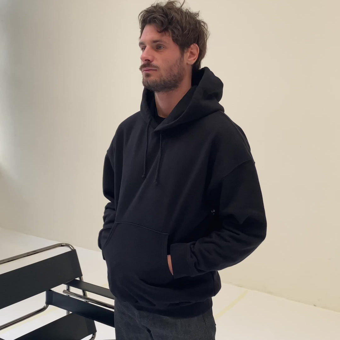 black hoodie "located in paris"
